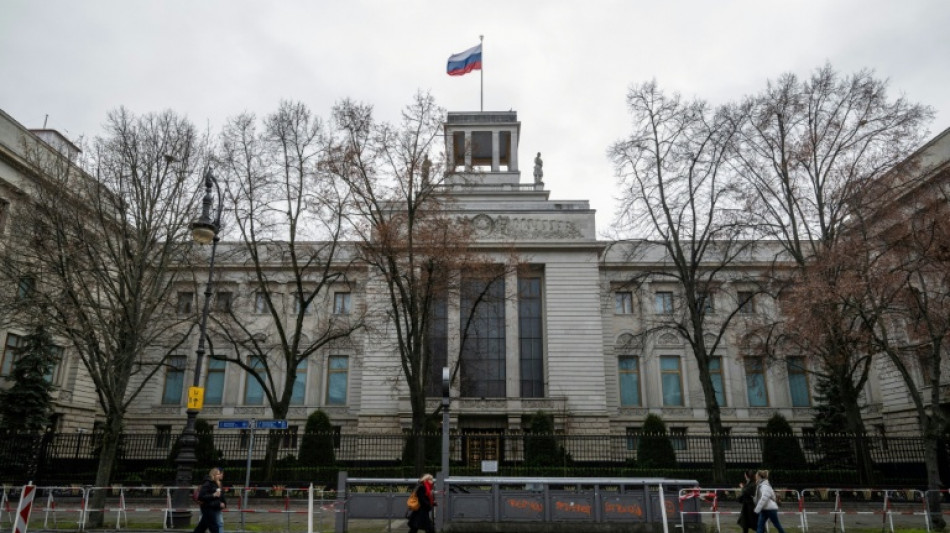 Germany summons Russian envoy, expels alleged spy handler