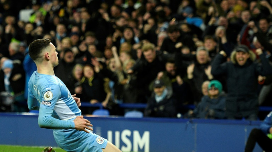 Man City survive Everton scare to go six points clear