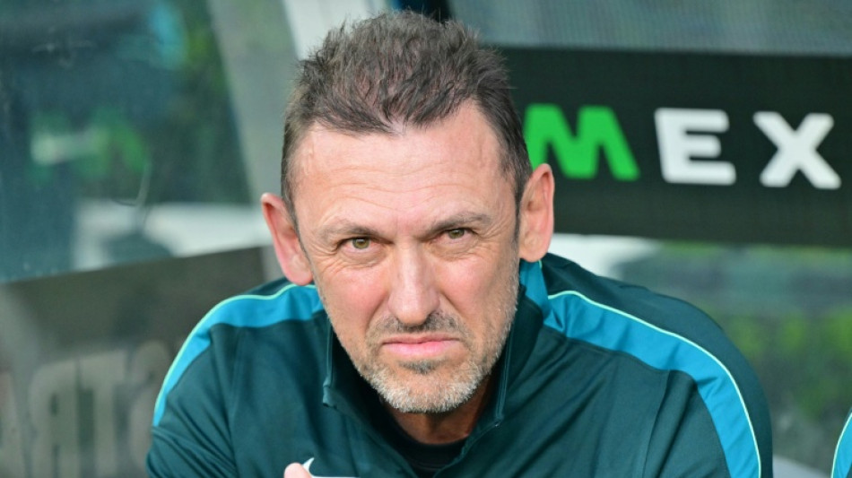 Australia coach Popovic extends contract ahead of World Cup opener
