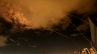 Iran, Israel trade strikes as diplomats work behind the scenes