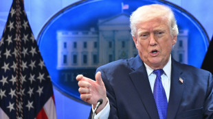 Stocks diverge, dollar down over Trump tariffs uncertainty