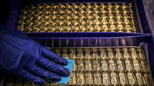 Precious metals fall again, Asian stocks swing as traders wind down