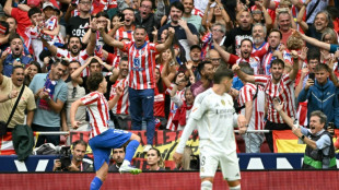 Atletico thrash Liga leaders Real Madrid in gripping derby