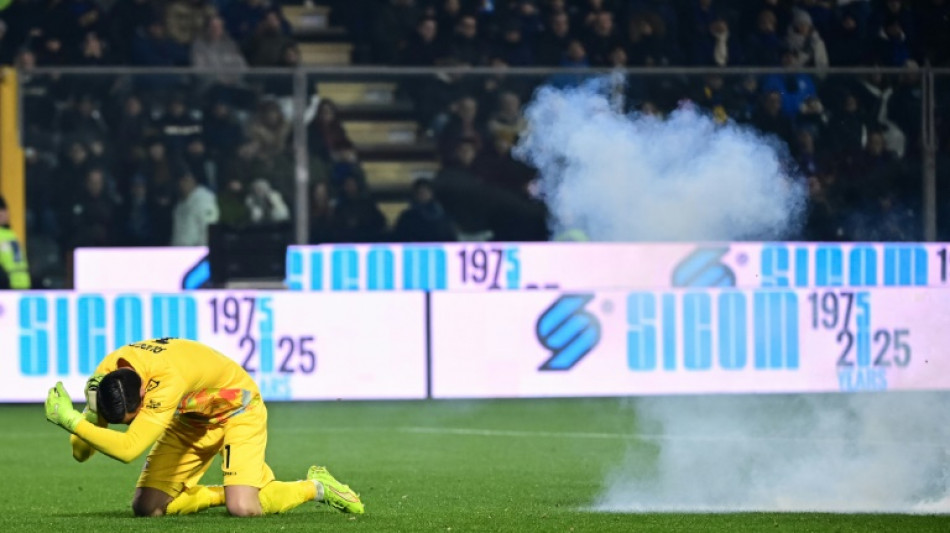 Inter eight clear after win at Cremonese marred by fans' flare flinging