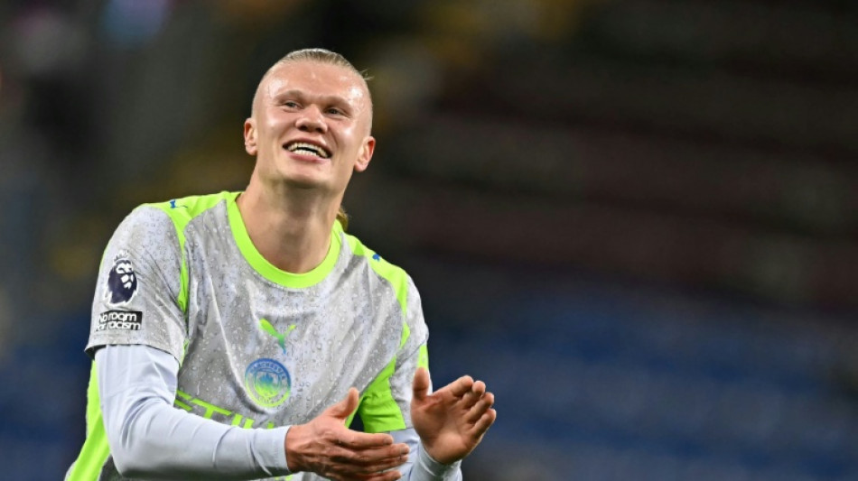 Manchester City go top of Premier League as Burnley relegated