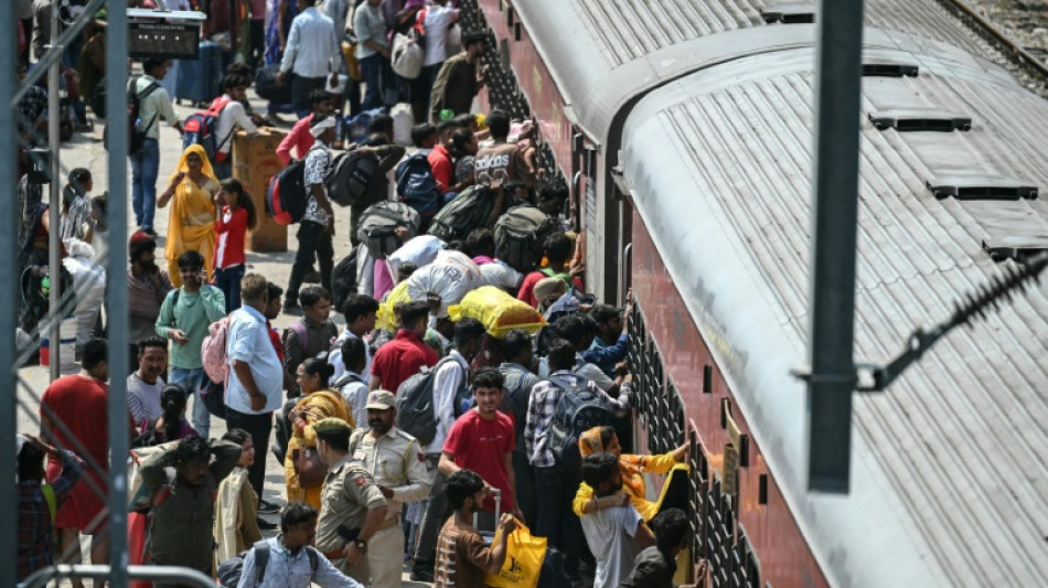 Panicked Indians flee Kashmir city on special train