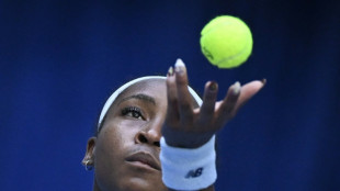 Gauff digs deep to keep China Open title defence alive