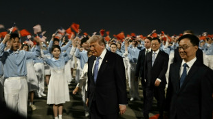 Trump and Xi meet for high-stakes talks in Beijing
