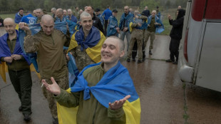 Kyiv in mourning after 24 killed as Ukraine, Russia swap POWs