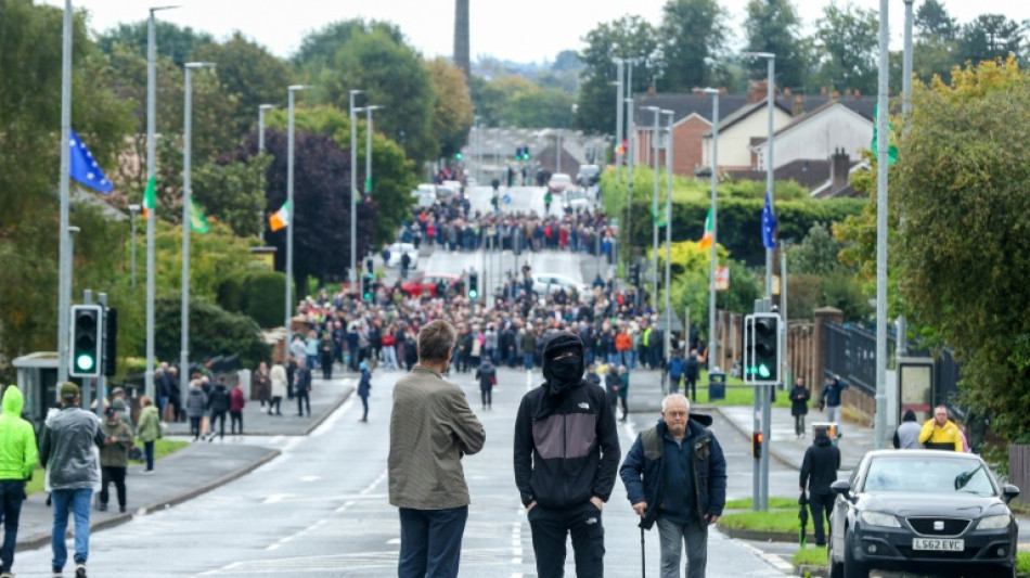 UK PM urges 'calm' as thousands block flashpoint N.Ireland parade