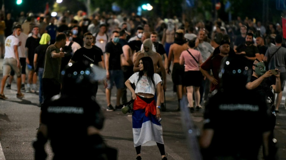 Serbian leader digs in, slams early elections rally