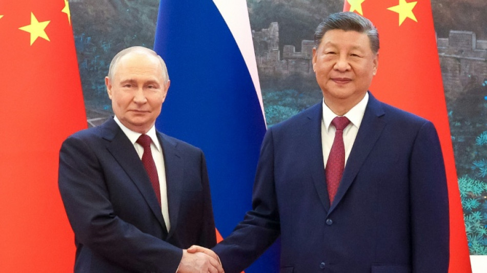 Putin, Xi hail 'unyielding' ties in talks after Trump visit