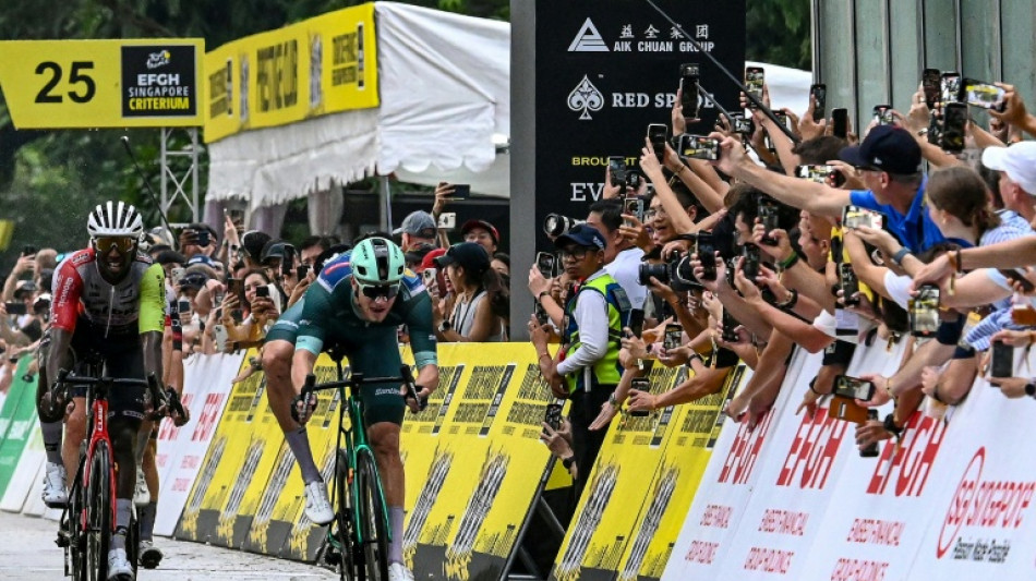 Jonathan Milan wins wet Tour de France Singapore Criterium