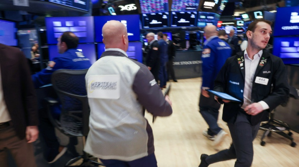 Trump vows huge new China tariffs as markets nosedive