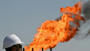 Oil surges 7%, stocks slip on Trump blockade warning