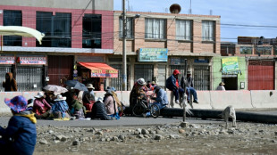 Bolivian police confront protesters blockading roads